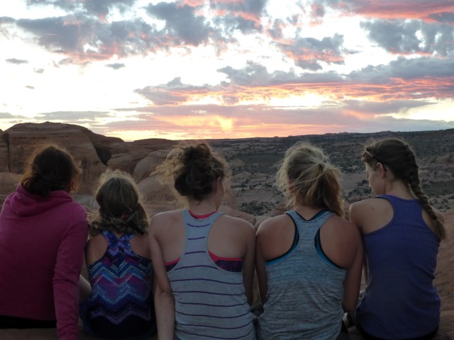 Susie, Maddy, Sequoia, Kady & Sedona watching the sun rise at Delicate Arch!