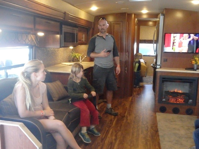Dynamax RV - huge workstation behind Dan! Perfect for working on the road!