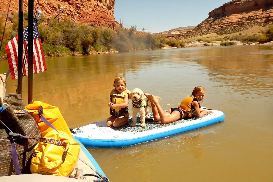 Floating of the Shaboomee SUP on our multiday family raft trip.